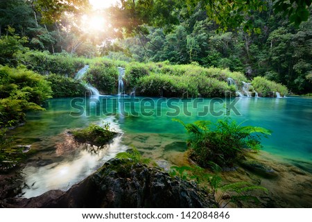 Cascades National Park in Guatemala Semuc Champey at sunset.