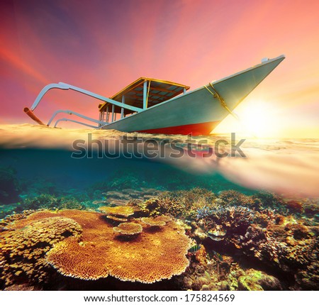 Diving boat at sunset.