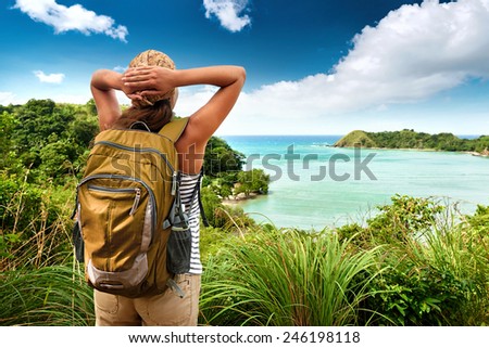 Tourist girl enjoying view of beautiful  hills and sea, traveling along Asia, active lifestyle concept