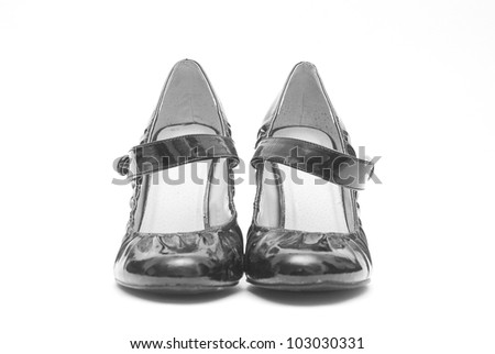Pair of Black Patent High Heel Shoes isolated on White Background