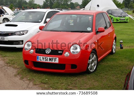 stock photo PETERBOROUGH ENGLAND MAY 24 Red Volkswagen Lupo GTi on May