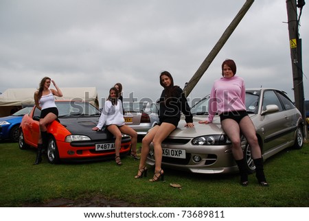 PETERBOROUGH, ENGLAND - MAY 24: British Mods Promo Girls with Modified Cars on May 24, 2008 in Peterborough, England, UK.  Peterborough Show Ground is Host to Annual Modified Nationals Automotive Show