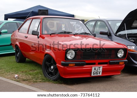 stock photo PETERBOROUGH ENGLAND May 24 Red MK2 Ford Escort on May