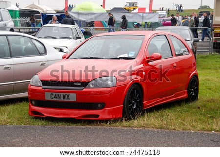 stock photo NORTHANTS ENGLAND AUG 2 Red Vauxhall Corsa C on display