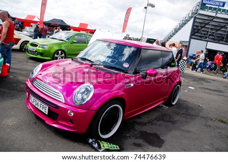 stock photo NORTHANTS ENGLAND AUG 2 Pink BMW Mini on display at