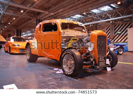 BIRMINGHAM, ENGLAND, JULY 5: Orange American Retro Car on Display at the Annual StreetLife Car Show on July 5, 2008 in Birmingham, England, UK.  Birmingham NEC is host to the show