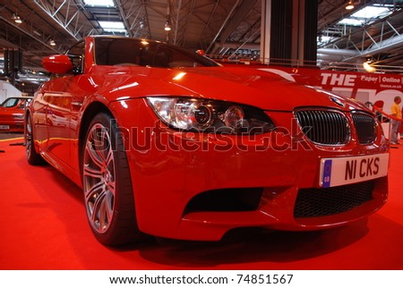BIRMINGHAM, ENGLAND, JULY 5: Red BMW M5 on Display at the Annual StreetLife Car Show on July 5, 2008 in Birmingham, England, UK.  Birmingham NEC is host to the show