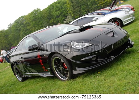 stock photo WAKEFIELD ENGLAND MAY 10 Black Toyota Celica with Decals 