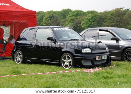 WAKEFIELD, ENGLAND - MAY 10: Black Nissan Micra on Display at the Annual Rising Sun Car Show on May 10, 2008 in Wakefield, England, UK.  Norton Priory is host to the show