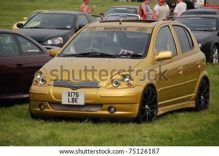 WAKEFIELD, ENGLAND - MAY 10: Gold Toyota Yaris on Display at the Annual Rising Sun Car Show on May 10, 2008 in Wakefield, England, UK.  Norton Priory is host to the show