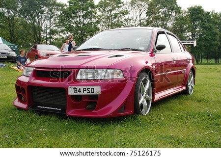 WAKEFIELD, ENGLAND - MAY 10: Pink Mitsubishi Lancer on Display at the Annual Rising Sun Car Show on May 10, 2008 in Wakefield, England, UK.  Norton Priory is host to the show