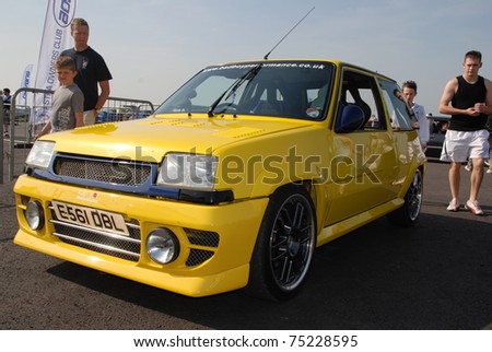 stock photo NORTHANTS ENGLAND MAY 11 Yellow Renault 5 on Display at