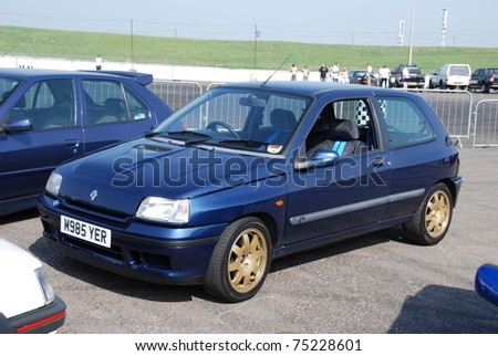 stock photo NORTHANTS ENGLAND MAY 11 Blue Renault Clio on Display at