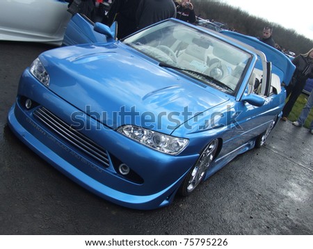 stock photo NORTHANTS ENGLAND MARCH 8 Blue Ford Escort Cabriolet on 