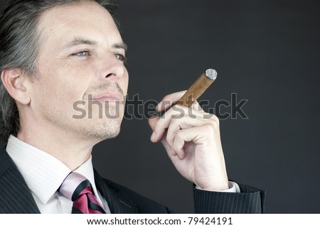 Holding Cigar