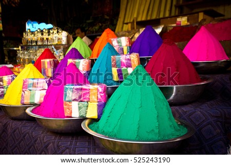 Colorful piles of powder sold on the market before Holi festival, Mysore, India