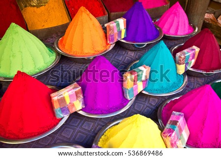 Colorful piles of powder sold on the market for Holi festival, Mysore, India