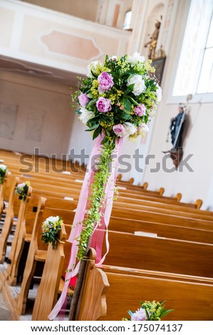 Wedding decoration with flowers in a Church