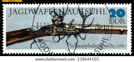GERMANY - CIRCA 1978: post stamps printed in Germany,  shows  antique  Spring-cock  Gun. 1780,  Hunting Guns series, circa 1978
