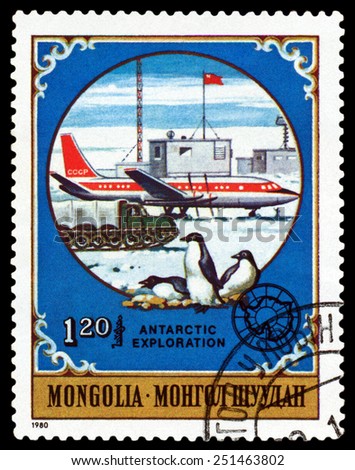 MONGOLIA - CIRCA 1980: a stamp printed by Mongolia  shows  Soviet plane and  penguins,  Antarctic Animals and exploration,  circa 1980