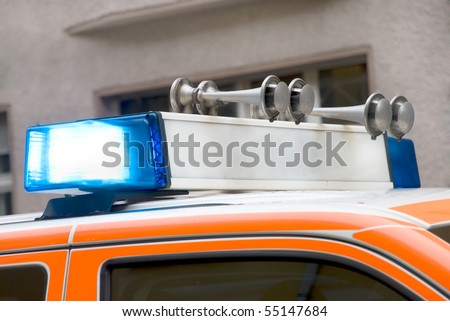 roof of a german emergency car with blue light