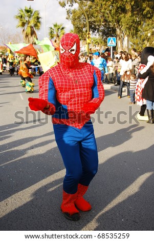 HUELVA - JANUARY 5: Three Kings, View of Spider-Man, the traditional Kings Day parade in street, january 5, 2011 in Huelva, Andalusia, Spain.