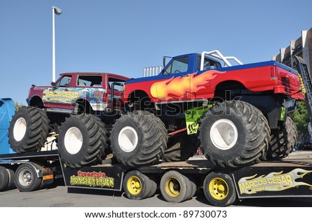 HUELVA, ANDALUSIA, SPAIN - JULY 21: Freestyle Motor truck show. A popular monster truck, is on display before a performance at stadium area at plaza de toros on July 21, 2011 in Huelva, Spain.