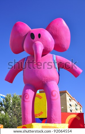 HUELVA, SPAIN - JANUARY 5: Pink elephant. Reyes Magos - Three Kings, The traditional parade in street, January 5, 2012 in Huelva, Andalusia, Spain.