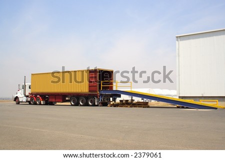 Truck backed onto loading dock