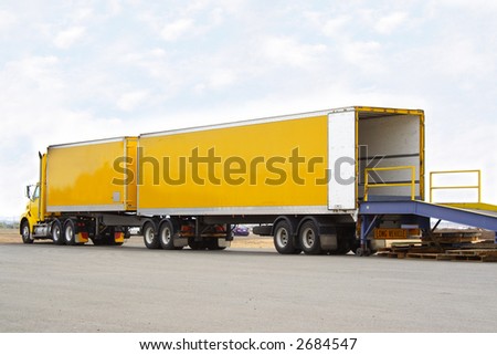 B double truck backed onto loading dock
