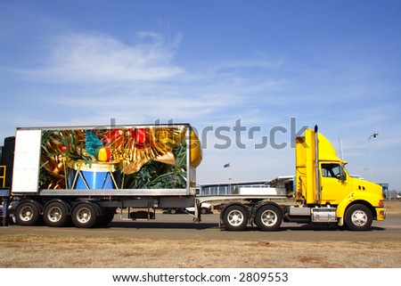 Semi trailer delivering christmas goods. Original  photo on trailer by photographer