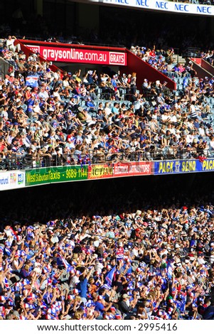 Editorial, crowd at Australian rules football stadium