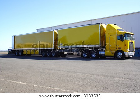 stock-photo-articulated-semi-truck-twin-trailer-3033535.jpg