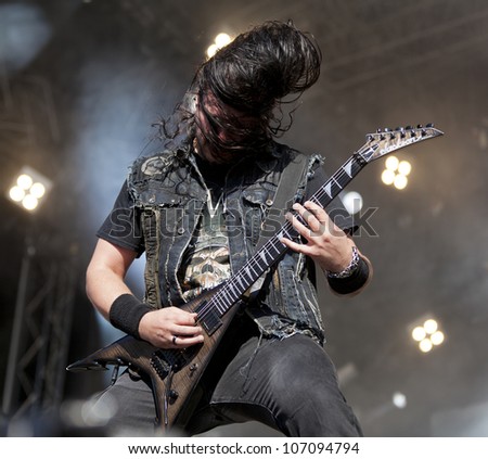 HELSINKI, FINLAND - JUNE 29: American heavy metal band Trivium performs live on stage June 29, 2012 at 15th annual Tuska Open Air Metal Festival in Suvilahti, in Helsinki, Finland.