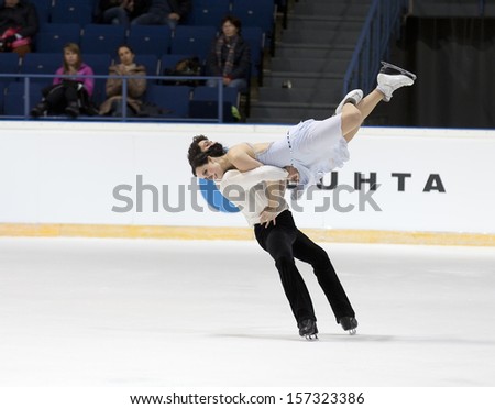 ESPOO,FINLAND-OCTOBER 5: Tessa Virtue andy Scott Moir from Canada compete in ice dance free dance skating event at the Finlandia Trophy Espoo 2013 on October 5,2013 at Barona Arena in Espoo, Finland
