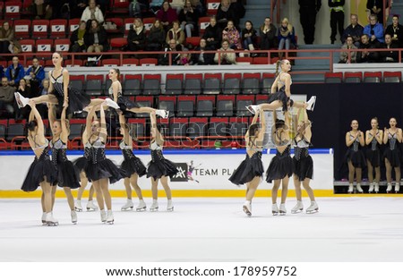 HELSINKI, FINLAND - FEBRUARY 23, 2014: Team Rockettes competes in Finnish Synchronized Skating Championships 2014  at the Helsinki Ice Hall. Team won silver.