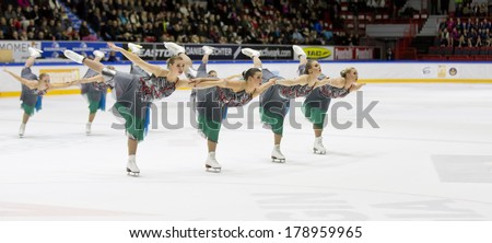 HELSINKI, FINLAND - FEBRUARY 23, 2014: Team Rockettes competes in Finnish Synchronized Skating Championships 2014  at the Helsinki Ice Hall. Team won silver.