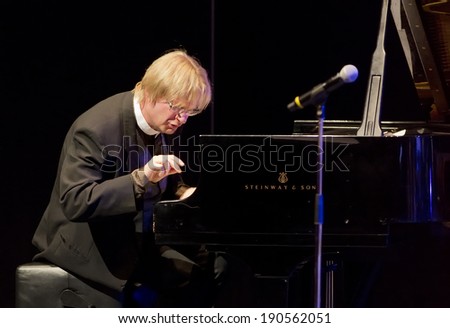 ESPOO, FINLAND - APRIL  25, 2014: Finnish jazz pianist  Iiro Rantala & Espoo Big Band perform live on 28th April Jazz. He is one of the best known Finnish jazz pianists, both in Finland and abroad.