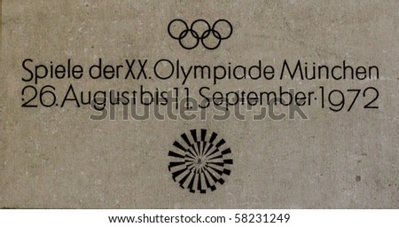 MUNICH, GERMANY - MAY  6: Olympic Rings and emblem on city wall in Munich , The Games of the XX Olympiad were celebrated in Munich from August 26 to September 11, 1972. Image taken on MAY 6, 2010 in Munich, Germany.