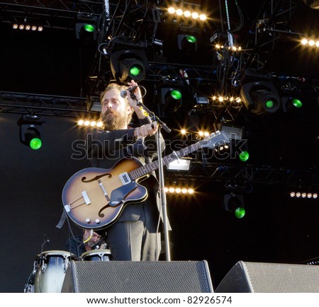 HELSINKI, FINLAND - AUGUST 13: American singer-songwriter Iron & Wine performs live on stage August 13, 2011 at Flow 2011 Festival in Helsinki, Finland.