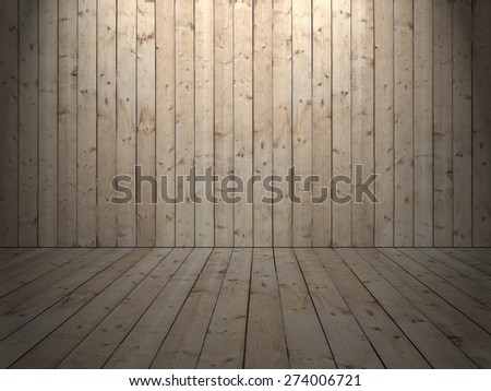 Room with wooden planked wall and flooring of rough sewed boards and light from ceiling