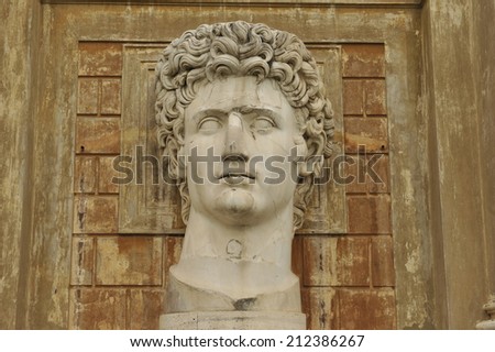 Classical Roman statue of a man with curly hair