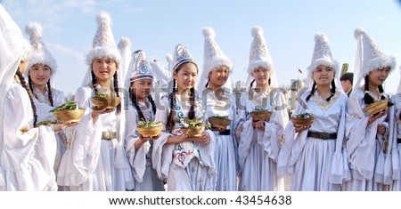 KYRGYZSTAN - MARCH 8: Women in traditional costume gather to celebrate International Women\'s Day on March 8 2009 in Kyrgyzstan.