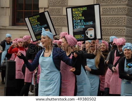 WESTMINSTER, LONDON - FEBRUARY 25: Fair trade campaigners dressed as tea ladies promote \'The Big Swap\' on February 25, 2010 in Westminster, London