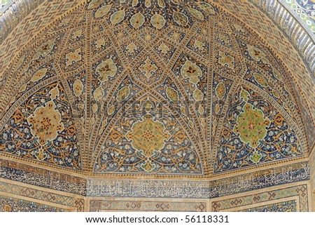 painted ceiling in the entrance to an islamic madrassa
