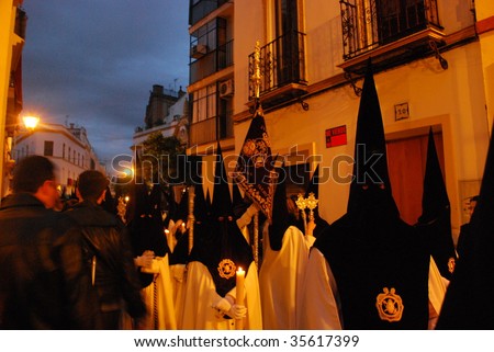 SEVILLE, SPAIN - APRIL 10: The Holy Week processions of Semana Santa climax during the early hours of Good Friday, April 10, 2009, in Seville, Spain.