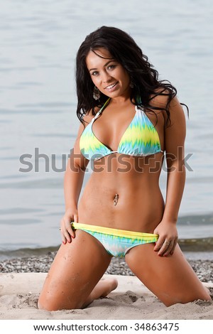 stock photo sexy busty swimsuit model on the beach stock photo sexy busty swimsuit model on the beach