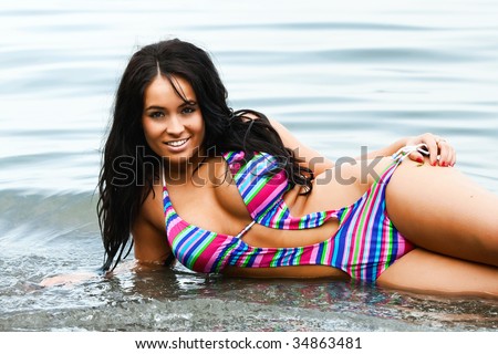 stock photo sexy busty swimsuit model on the beach