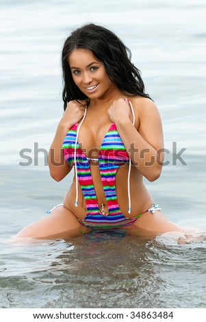 stock photo sexy busty swimsuit model on the beach stock photo sexy busty swimsuit model on the beach
