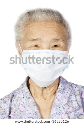 Grandmother wearing a surgical face mask with white background.